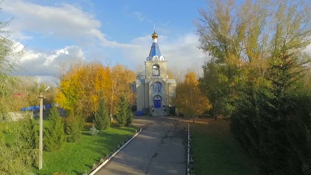Aerial shot of church in little town in Russia.