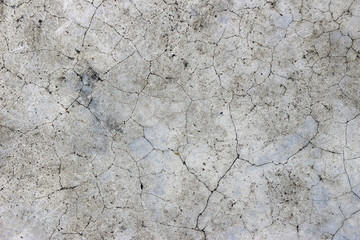 Aged cracked concrete stone plaster wall background and texture