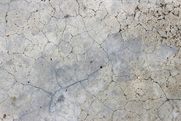 Aged cracked concrete stone plaster wall background and texture