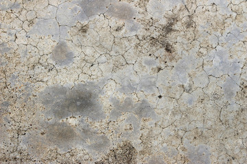 Aged cracked concrete stone plaster wall background and texture