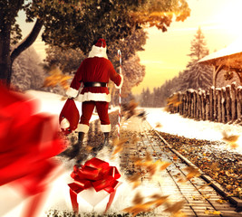 santa claus on street and gifts 