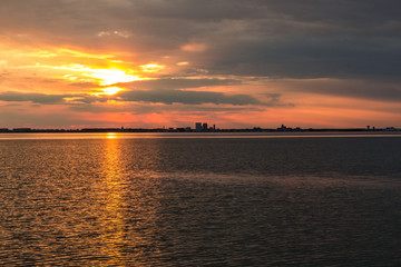 beabutiful sunset ower sea © Tomtsya