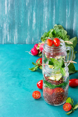 Salads with quinoa in jars