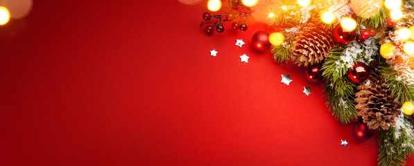 Christmas holidays composition on red background with copy space
