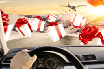 car interior with driver and plane on sky 