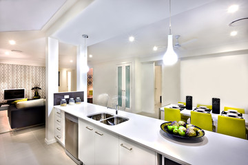 Interior of a modern house, including counter top with sink and