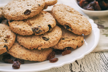 Wholewheat biscuits with raisins on white plate