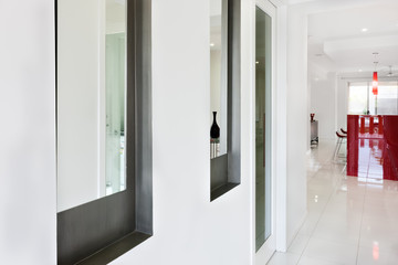 Interior of a modern house with hallway and close view of a wind