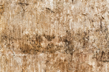 Dirty brown stone wall texture