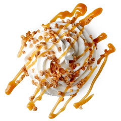 Whipped cream with caramel sauce and nuts