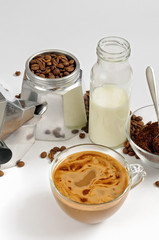 Coffee beans and ground, milk in a bottle, Moka pot