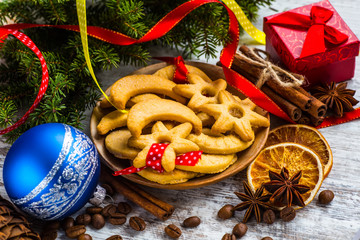 Christmas cookies with ginger decorated with red ribbon