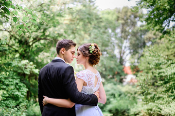 Fototapeta premium nice portrait of young and beautiful bride and groom