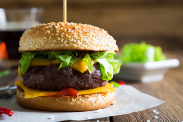 Cheeseburger on a wooden table