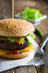 Cheeseburger on a wooden table