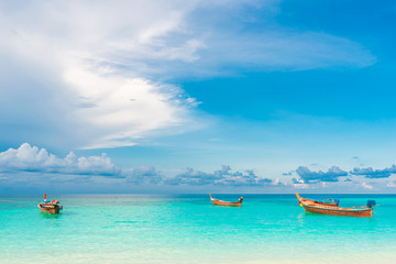 Naklejka na ściany i meble Boat with sea and sky background vacation time