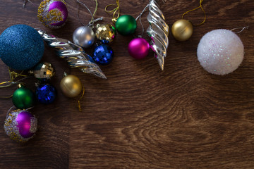 New Year tree decorations wooden background
