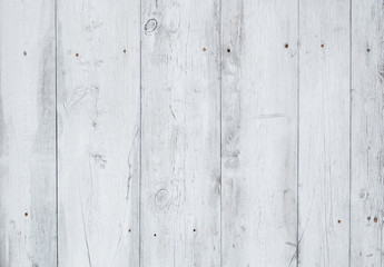 Fototapeta na wymiar white old wooden fence. wood palisade background. planks texture