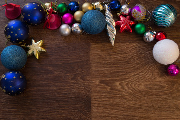 New Year tree decorations wooden background