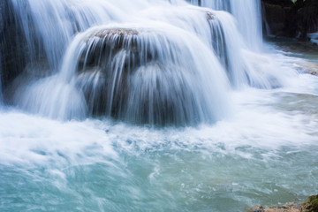 Foggy landscape of cascade at Tad Kuang si Natural waterfall in Luang prabang Laos, Asian travel