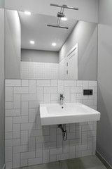 Fototapeta premium bathroom interior with a wash basin, sink and mirror