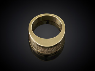 Golden ring with ashes isolated on black