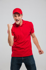 Naklejka premium Photo of happy deliveryman