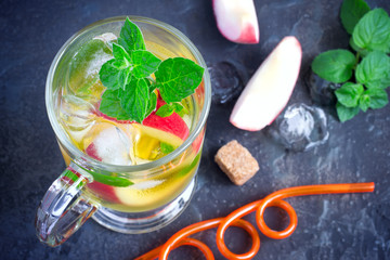 Peach sweet iced tea with mint closeup