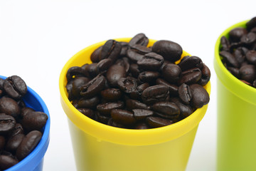 Close up of Coffee Bean in Yellow Glass