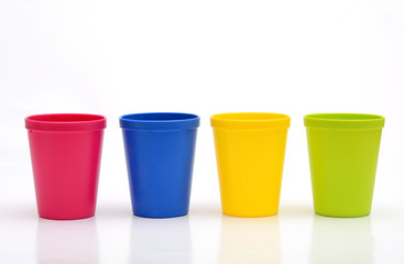 Set of Colorful Plastic Glasses on White background