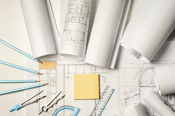 Workplace of architect - rolls and plans.
