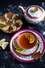 Tea with lemon and Christmas cookies