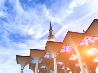 Minarets of Sultan Salahuddin Abdul Aziz Mosque, Shah Alam, Selangor, Malaysia - Evening sunlight through the mosque