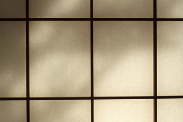 Shaded shoji - Japanese traditional paper-and-wood partition - obrazy, fototapety, plakaty
