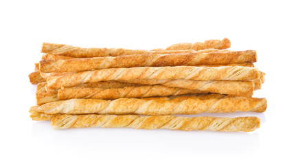 pile of delicious pretzel sticks isolated on white background
