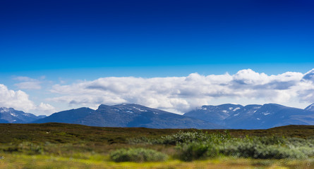 Norway mountains on plains landscape background