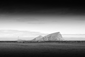 Fototapeta na wymiar Black and white Norway island landscape background