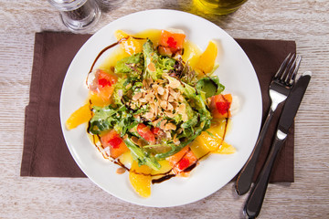 salad with red fish and orange