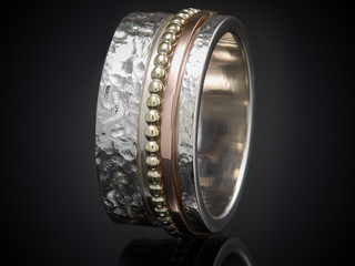 beautiful silver ring isolated on black background