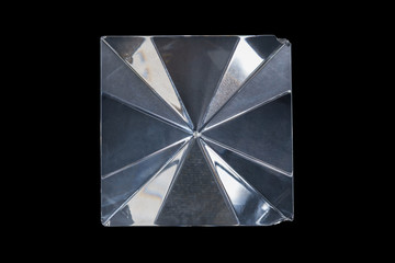 Pyramid glass / View of pyramid glass on black background. Bottom view.