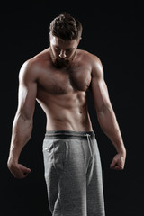 Fototapeta na wymiar Naked muscular man posing