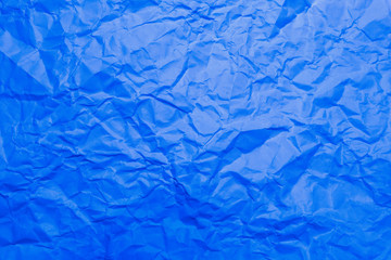 Blaues zerknittertes Papier als Muster