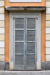 Old door with blue shutters