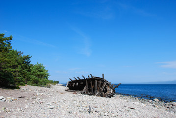 Wooden shipwreck by the coast