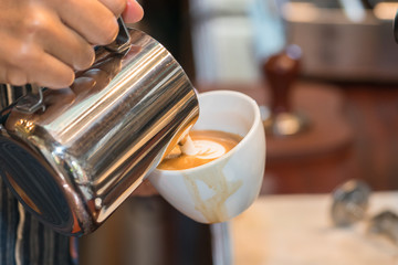 Fototapeta na wymiar Latte art coffee cup 