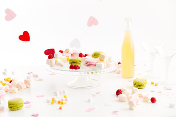 French macaroons, berries, marshmallows and lemonade