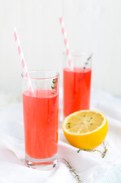 Pink fruit lemonade and  lemon
