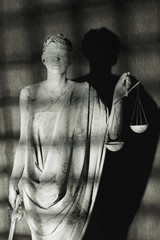 Nemesis behind prison bars