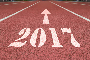 background of running track in stadium with the arrow point to 2