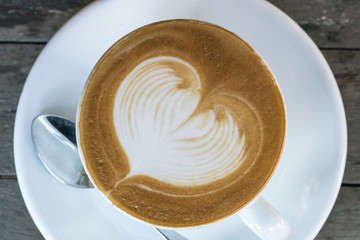 Coffee Cup on Wood Background

